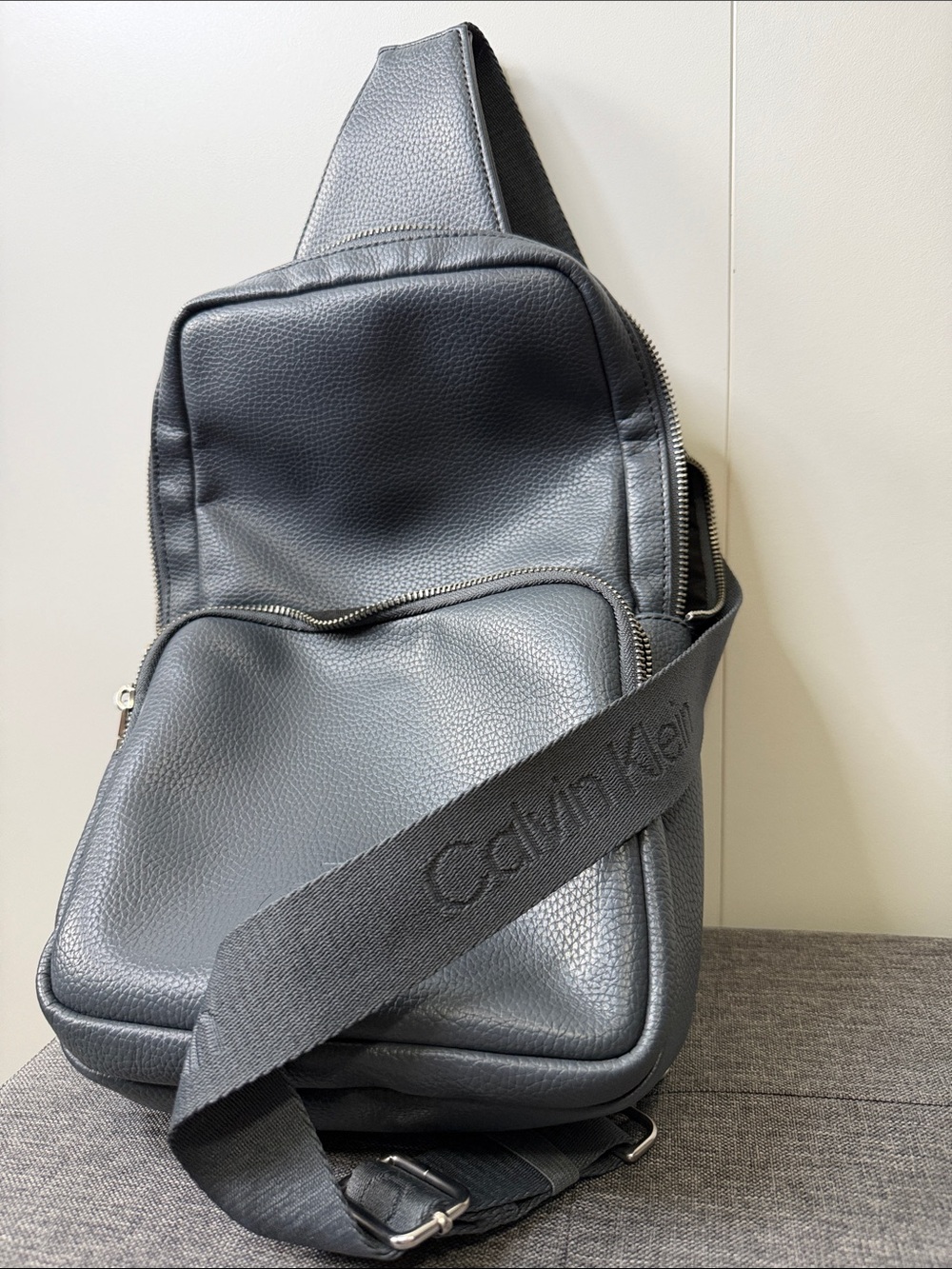 Calvin Klein Men's Dark Gray Pebbled Leather Sling Bag